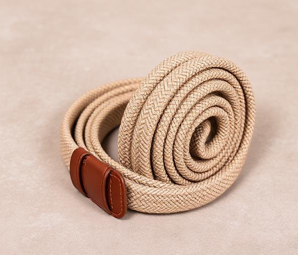 Coiled braided elastic stretch belt with leather tab